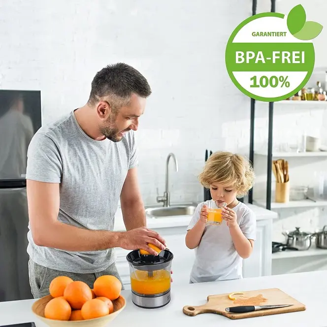 A dad cooking with a boy